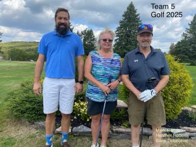 Team 5 of the PLRA golf tournament; Bane, Heather, Mark