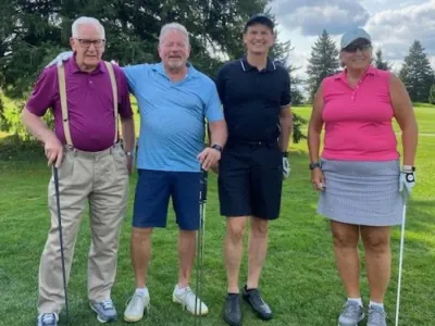 Dave, Rob, James and Diane gather for a team photo.